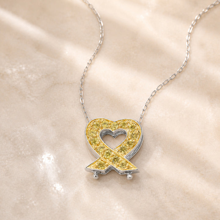 DP3741 - 14K White Gold Yellow Sapphire Heart Pendant