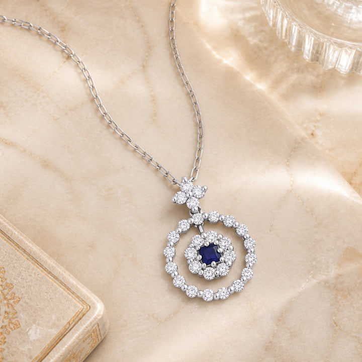 DP4328 - 18K White Gold Sapphire Round Pendant
