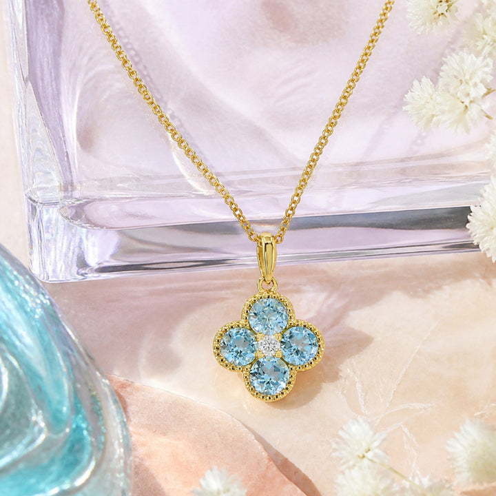 Madison L 14K Yellow Gold Blue Topaz Flower Pendant - style N1871BTY