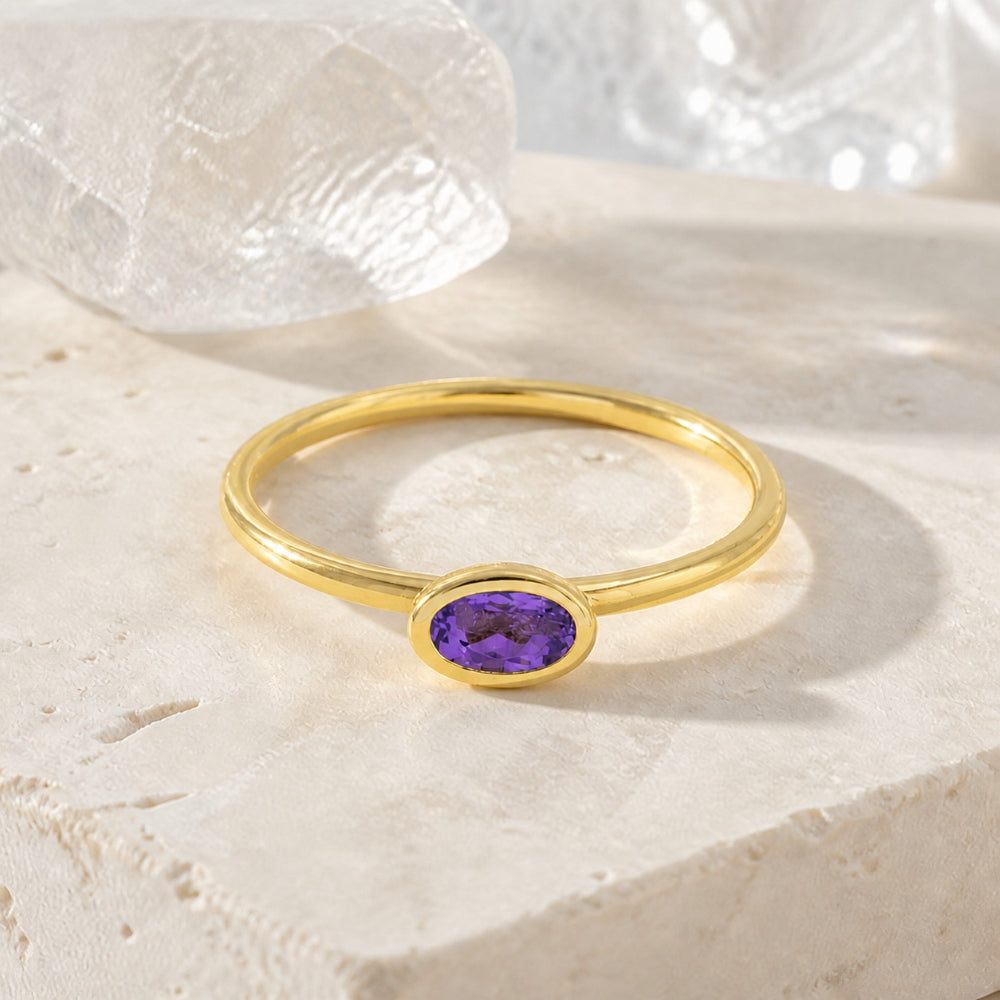 R1499 - 14K Yellow Gold Aquamarine & Garnet Oval Ring